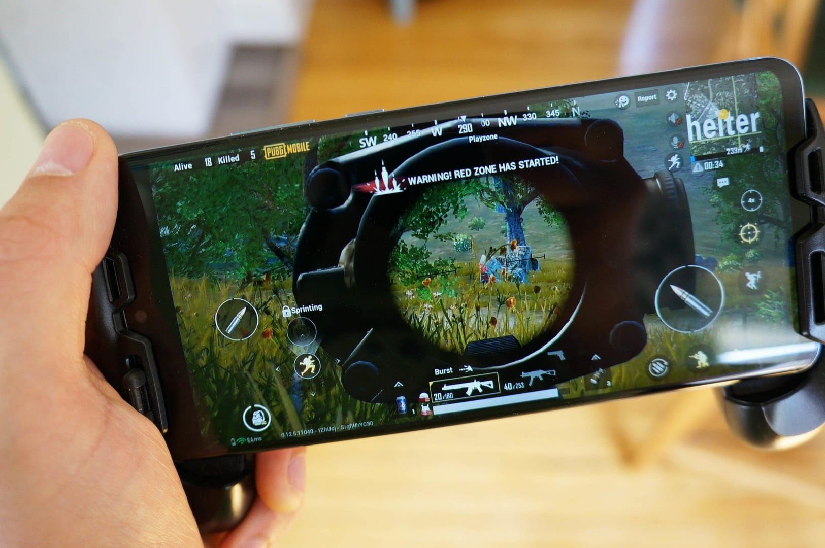 PUBG Mobile gyroscope control guide showing phone movement directions for aiming