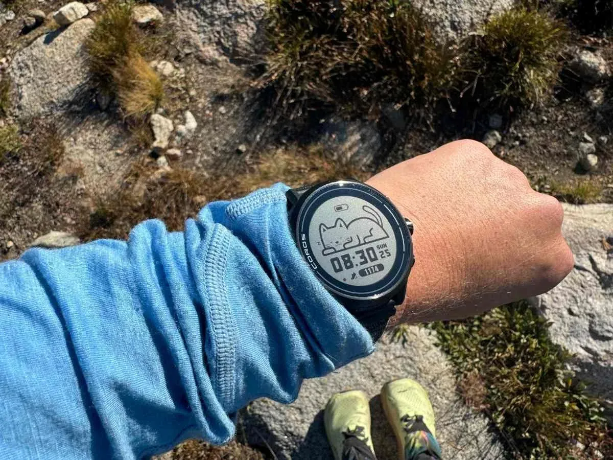 Smartwatch calibrating stride motion on an athletic track