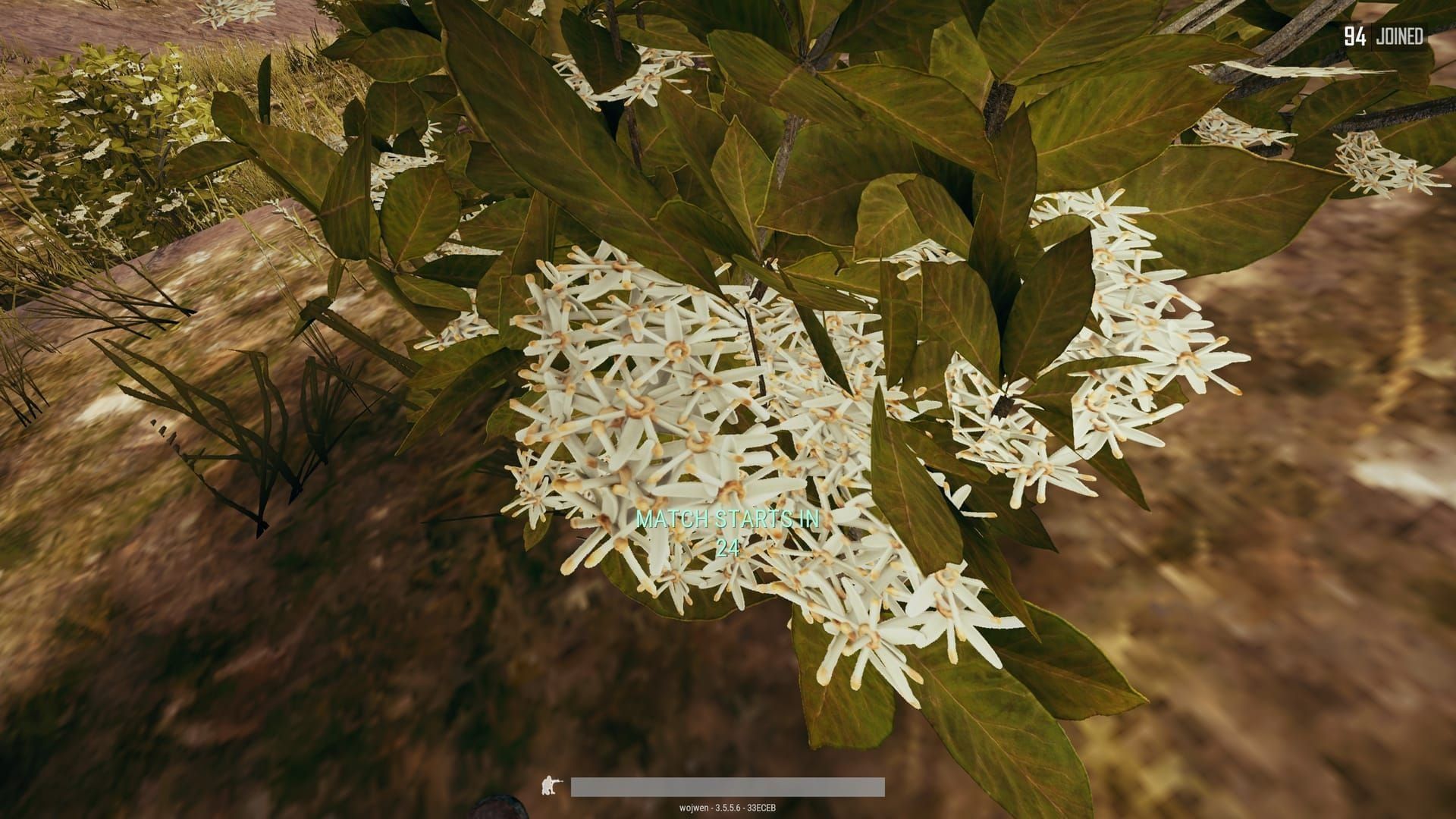 PUBG Mobile screenshot of eliminating Guardian Flower on World Tree branch revealing loot in v4.2